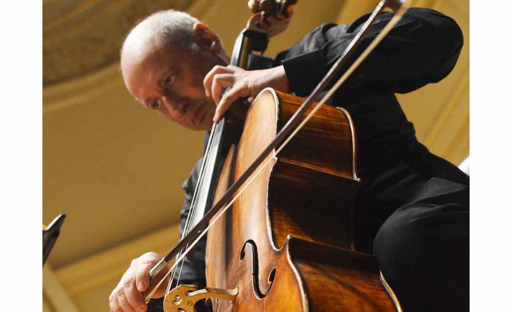cellist playing the cello